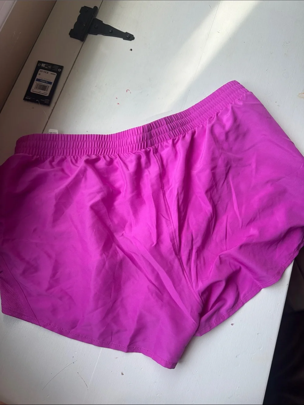 Under Armour Women’s Bright Pink Athletic Shorts